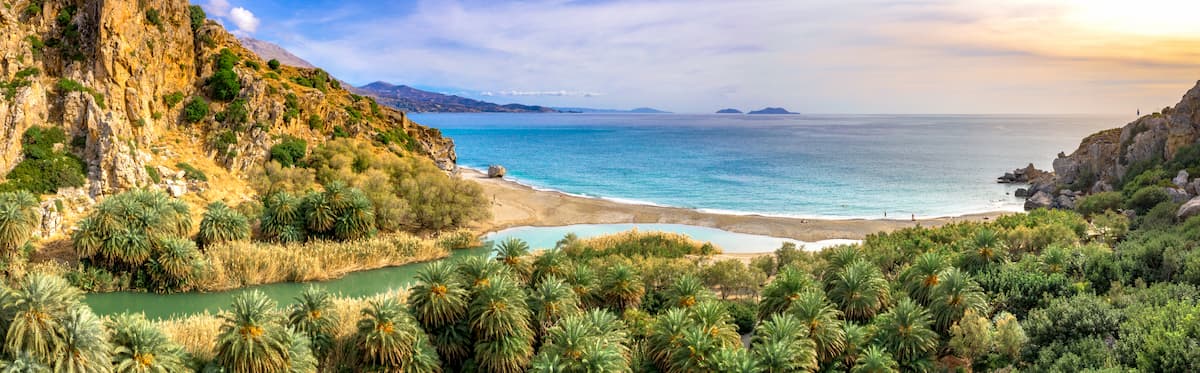 Preveli beach at Libyan sea, river and palm forest, southern Crete, Greece