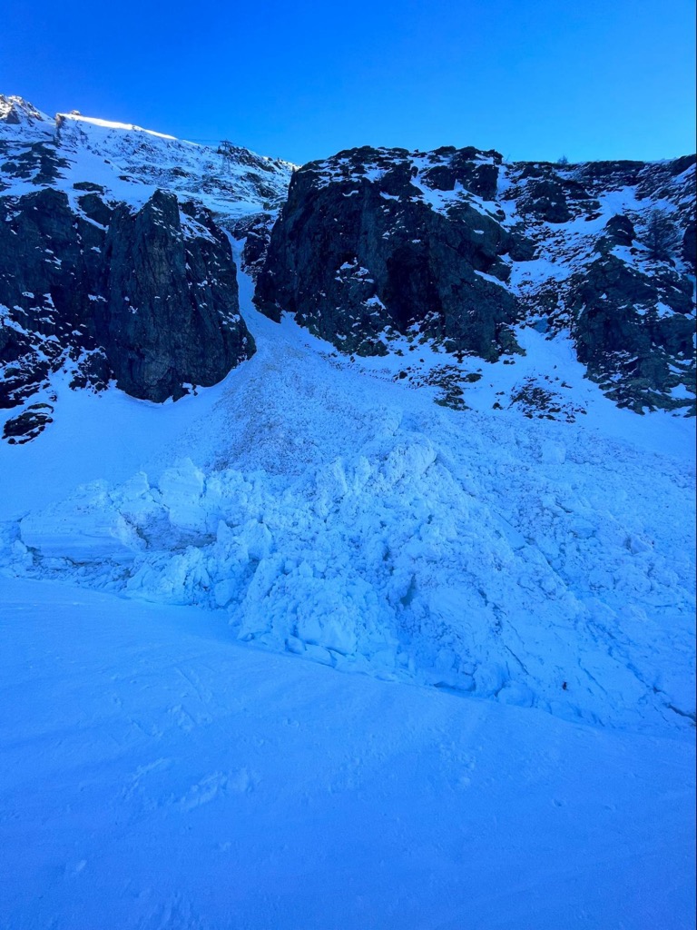 Avalanche debris at the bottom of a couloir. Photo: Sergei Poljak. Avalanche Safety