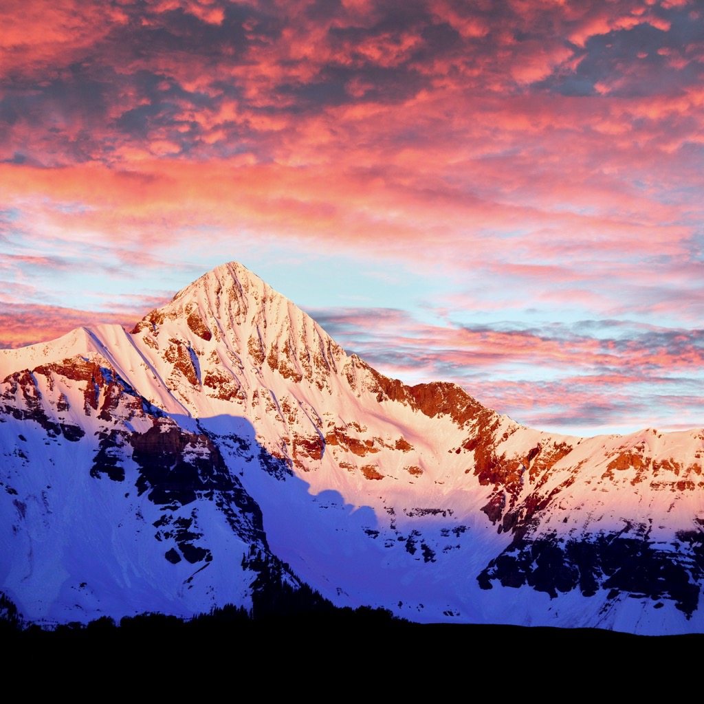Sun setting on a Classic. Skiing a San Juan Classic: Wilson Peak (The Coors Face), Northeast Couloir