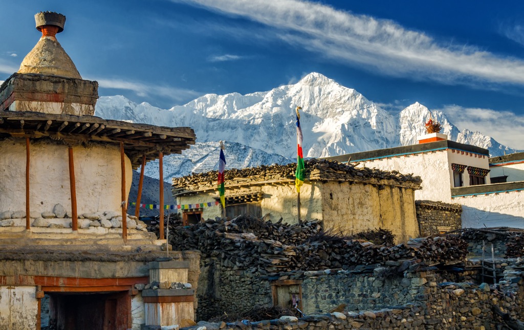Best hiking. A Buddhist stupa with views of Nhilgiri North on the Annapurna Circuit